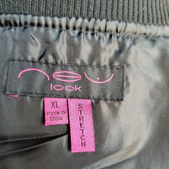 Gray and black jacket with grommet details. - Picture 4 of 8